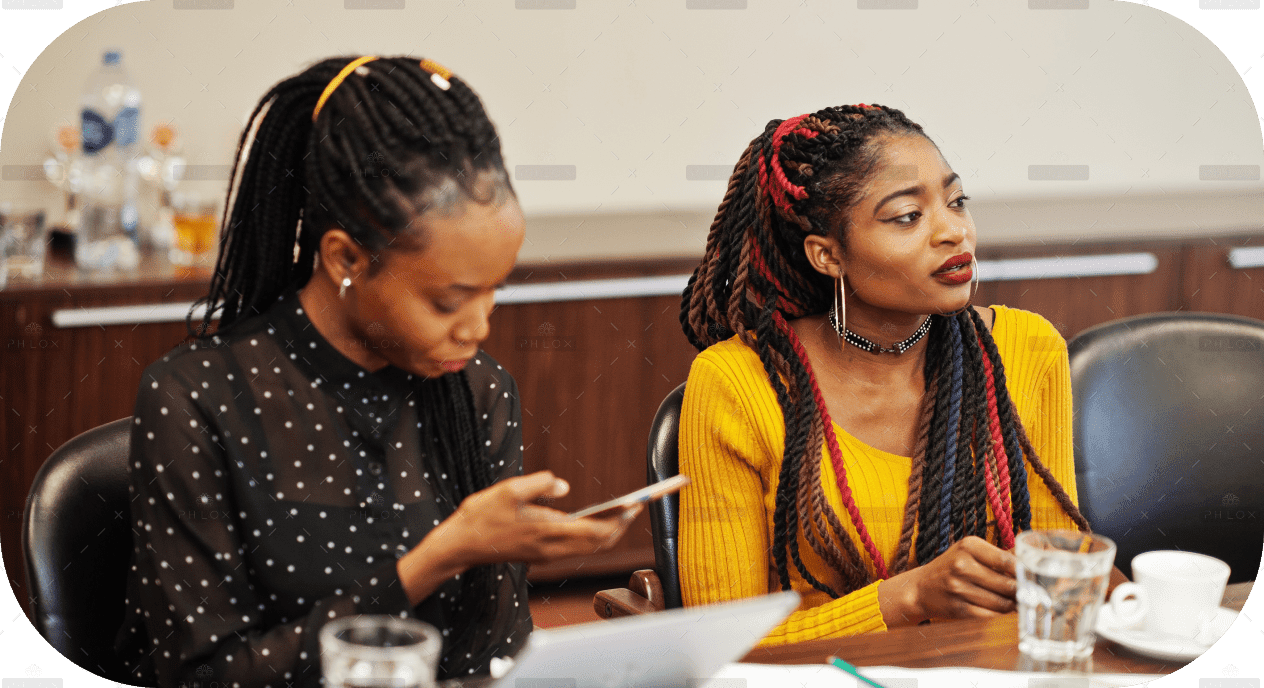 demo-attachment-1500-african-american-women-colleagues-crew-divercity-female-partners-office-sit-table-1